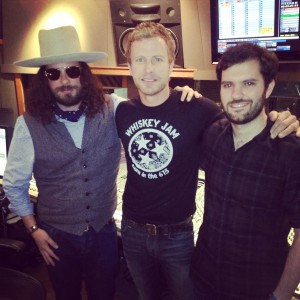 Dierks Bentley (centre) in the studio with Jingle Punks' Jared Gutstadt (right) and songwriter Jeff Peters (left).