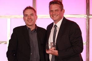 Indiewire's Michael Schneider with keynote speaker and Realscreen's 2016 Television Trailblazer Paul Telegdy