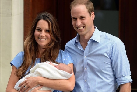The Duchess of Cambridge and Prince William with Prince George. Photo: Andrew Parsons/REX/Woodcut Media